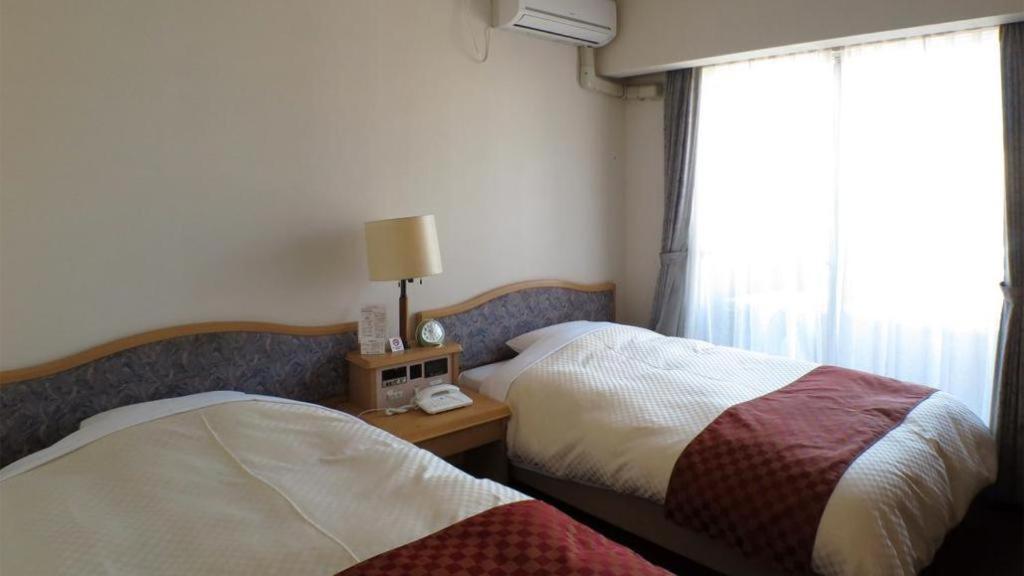 Hotel Tenchikaku Hitacsi Kültér fotó