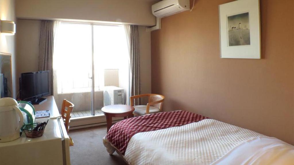 Hotel Tenchikaku Hitacsi Kültér fotó