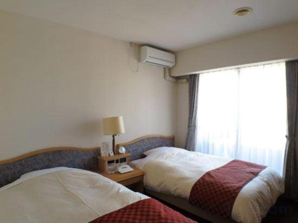 Hotel Tenchikaku Hitacsi Kültér fotó