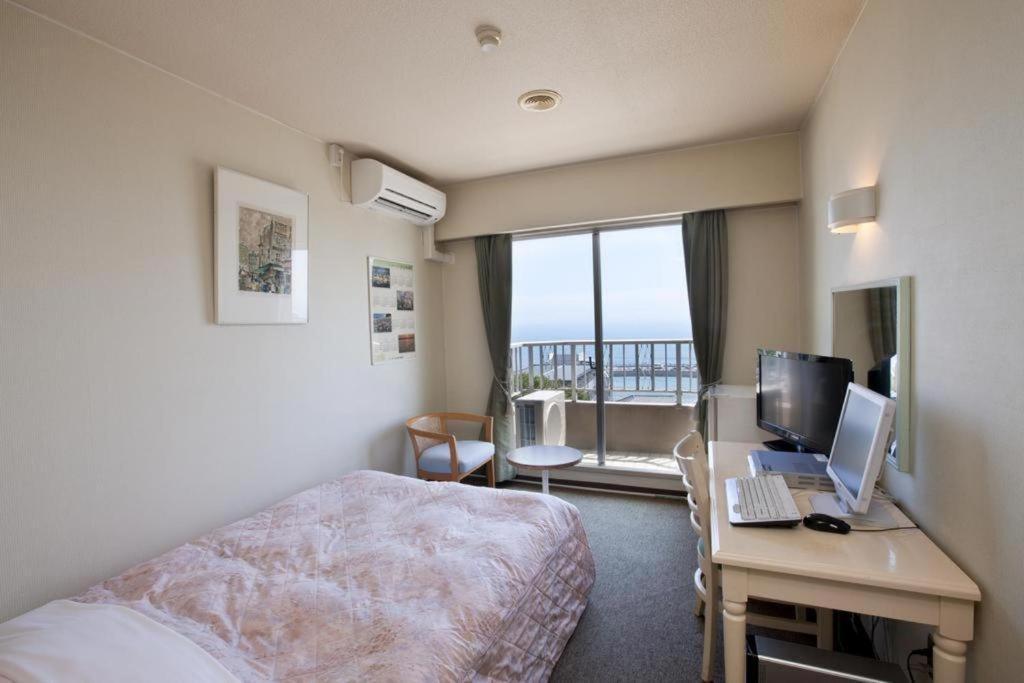 Hotel Tenchikaku Hitacsi Kültér fotó