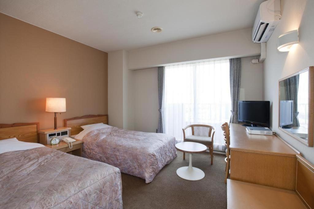 Hotel Tenchikaku Hitacsi Kültér fotó